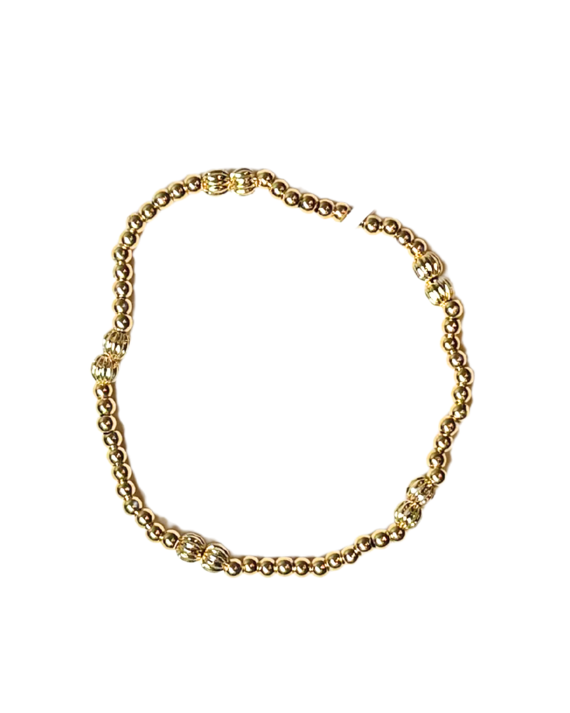 Gold 3mm Stretch Bead with Larger Accent Beads