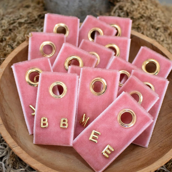 Gold Initial Stud Earring On Velvet Tag